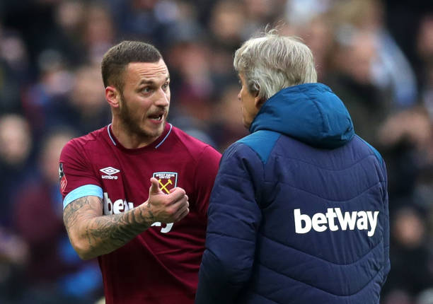LONDON, ENGLAND - JANUARY 05:  Marko Arnautovic of West Ham United argues with Manuel Pellegrini, Manager of West Ham United after being substitute during the FA Cup Third Round match between West Ham United and Birmingham City at The London Stadium on January 5, 2019 in London, United Kingdom.  (Photo by Alex Morton/Getty Images)