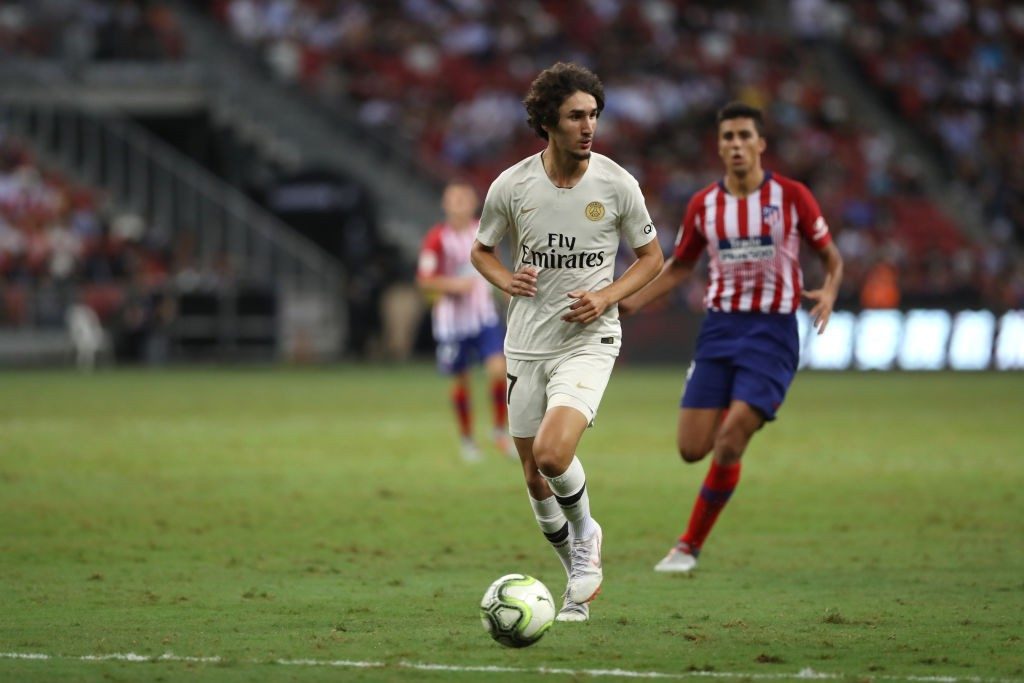 SINGAPORE, SINGAPORE - JULY 30: Yacine Adli of Paris Saint Germain goes after the ball during the International Champions Cup match between Paris Saint Germain and Club de Atletico Madrid at the National Stadium on July 30, 2018 in Singapore. (Photo by Lionel Ng/Getty Images)