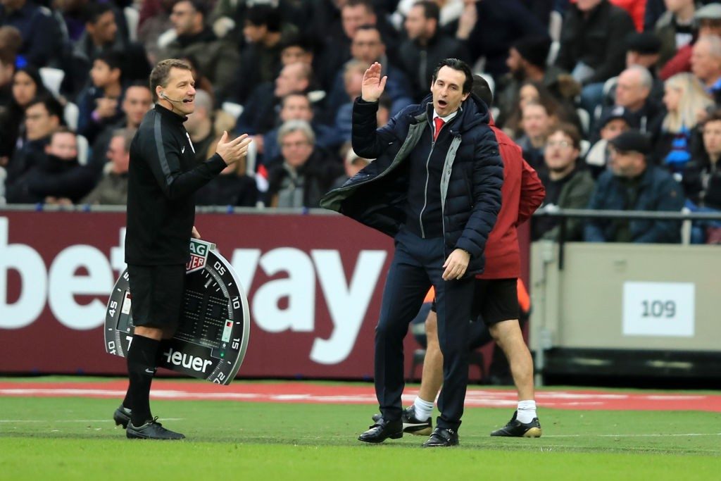 LONDON, ENGLAND - JANUARY 12: Unai Emery, Manager of Arsenal complains to the fourth official during the Premier League match between West Ham United and Arsenal FC at London Stadium on January 12, 2019 in London, United Kingdom. (Photo by Marc Atkins/Getty Images)