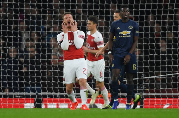 LONDON, ENGLAND - JANUARY 25: Shkodran Mustafi of Arsenal (20) reacts after a missed chance during the FA Cup Fourth Round match between Arsenal and Manchester United at Emirates Stadium on January 25, 2019 in London, United Kingdom. (Photo by Mike Hewitt/Getty Images)
