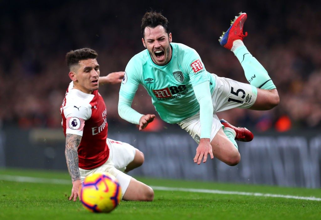 LONDON, ENGLAND - FEBRUARY 27: Lucas Torreira of Arsenal tackles Adam Smith of AFC Bournemouth during the Premier League match between Arsenal FC and AFC Bournemouth at Emirates Stadium on February 27, 2019 in London, United Kingdom. (Photo by Catherine Ivill/Getty Images)