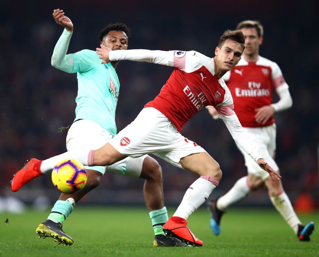 LONDON, ENGLAND - FEBRUARY 27: Lys Mousset of AFC Bournemouth battles for possession with Denis Suarez of Arsenal during the Premier League match between Arsenal FC and AFC Bournemouth at Emirates Stadium on February 27, 2019 in London, United Kingdom. (Photo by Julian Finney/Getty Images)