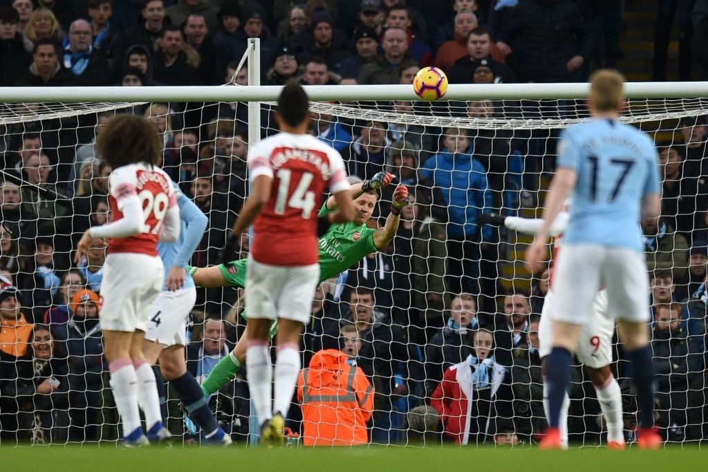 Arsenal's German goalkeeper Bernd Leno makes a save during the English Premier League football match between Manchester City and Arsenal at the Etihad Stadium in Manchester, north west England, on February 3, 2019. (Photo by OLI SCARFF/AFP/Getty Images)