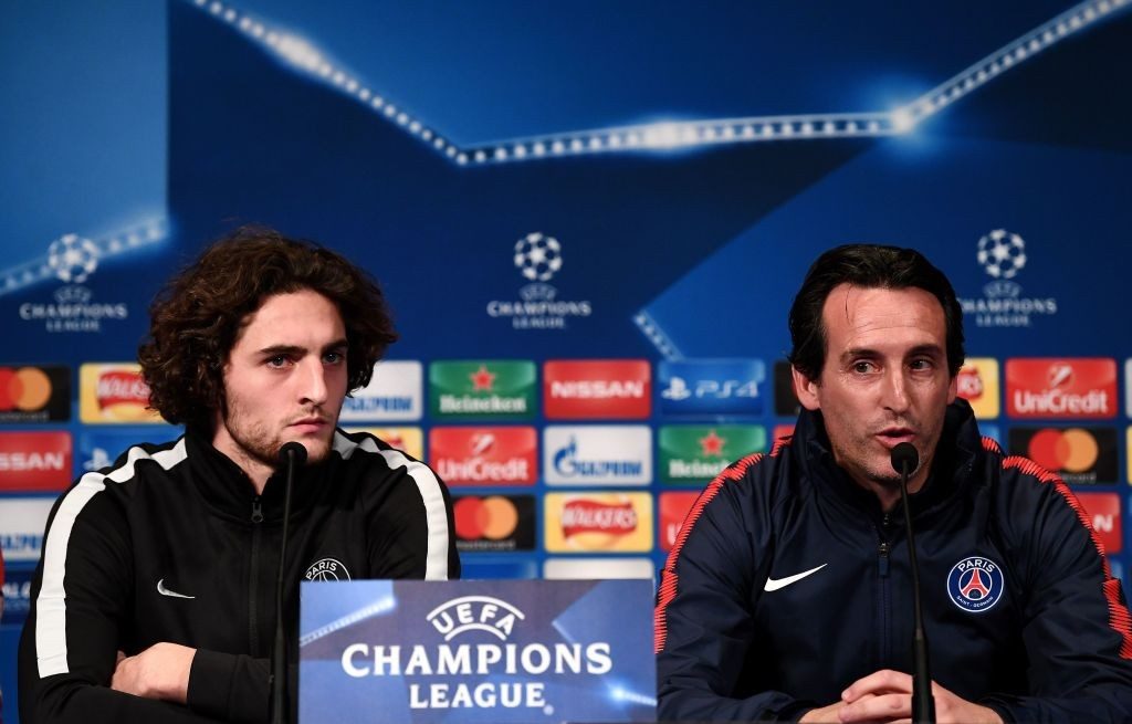 Paris Saint-Germain's Spanish headcoach Unai Emery (R) and Paris Saint-Germain's French midfielder Adrien Rabiot give a press conference at the Parc des Princes stadium in Paris on October 30, 2017 on the eve of the UEFA Champions League football match against Anderlecht. (Photo by FRANCK FIFE/AFP/Getty Images)