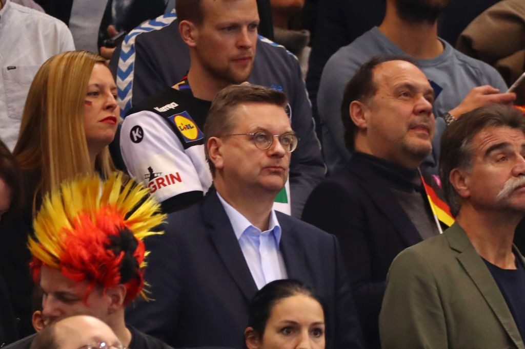 HAMBURG, GERMANY - JANUARY 25: Reinhard Grindel, president of the German Football Association looks on from the stands prior to the 26th IHF Men's World Championship semifinal between Germany and Norway at Barclaycard Arena on January 25, 2019 in Hamburg, Germany. (Photo by Martin Rose/Bongarts/Getty Images)