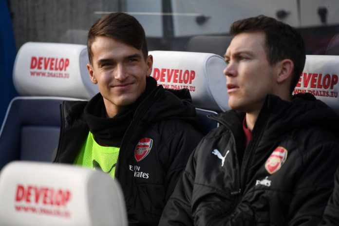HUDDERSFIELD, ENGLAND - FEBRUARY 09: Denis Suarez of Arsenal looks on from the bench prior to the Premier League match between Huddersfield Town and Arsenal FC at John Smith's Stadium on February 9, 2019 in Huddersfield, United Kingdom. (Photo by Gareth Copley/Getty Images)
