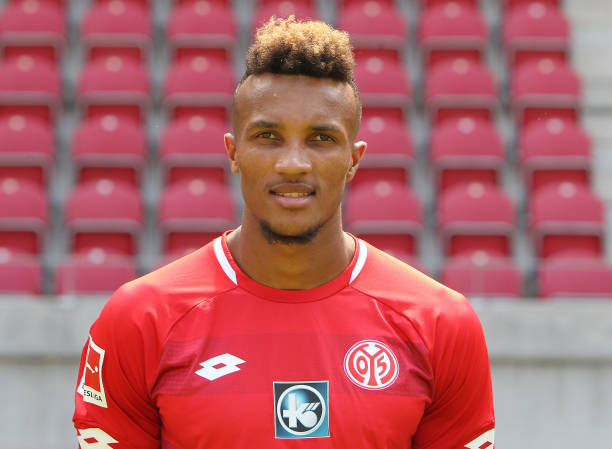 Jean-Philippe Gbamin of the German First division Bundesliga football club Mainz 05 poses during the team presentation for the season 2018/2019 on July 24, 2018 in Mainz. (Photo by Daniel ROLAND / AFP)