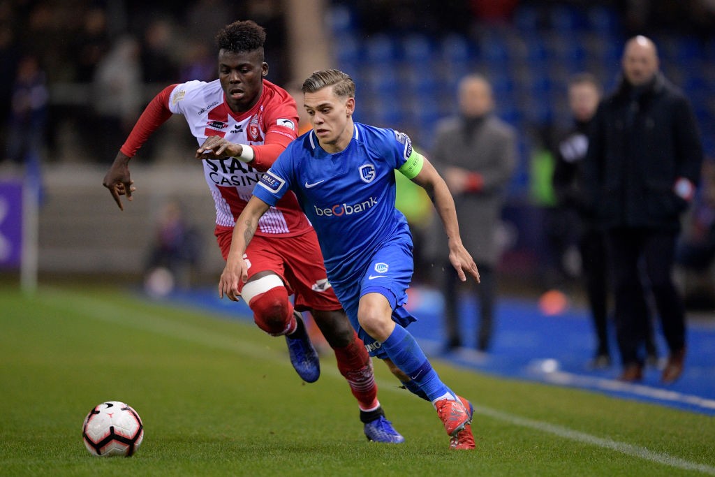 Mouscron's Franck Boya and Genk's Leandro Trossard fight for the ball during a soccer match between KRC Genk and Royal Excel Mouscron, Saturday 26 January 2019 in Genk, on the 23rd day of the 'Jupiler Pro League' Belgian soccer championship season 2018-2019. (Photo by YORICK JANSENS/AFP/Getty Images)