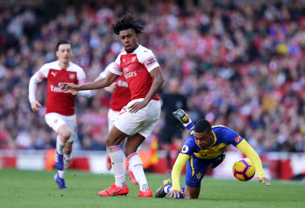 LONDON, ENGLAND - FEBRUARY 24:  Alex Iwobi of Arsenal battles for possession with Yan Valery of Southampton during the Premier League match between Arsenal FC and Southampton FC at Emirates Stadium on February 23, 2019 in London, United Kingdom.  (Photo by Richard Heathcote/Getty Images)
