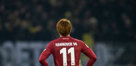 DORTMUND, GERMANY - JANUARY 26: Takuma Asano of Hannover seen from the back during the Bundesliga match between Borussia Dortmund and Hannover 96 at the Signal Iduna Park on January 26, 2019 in Dortmund, Germany. (Photo by Jörg Schüler/Getty Images)