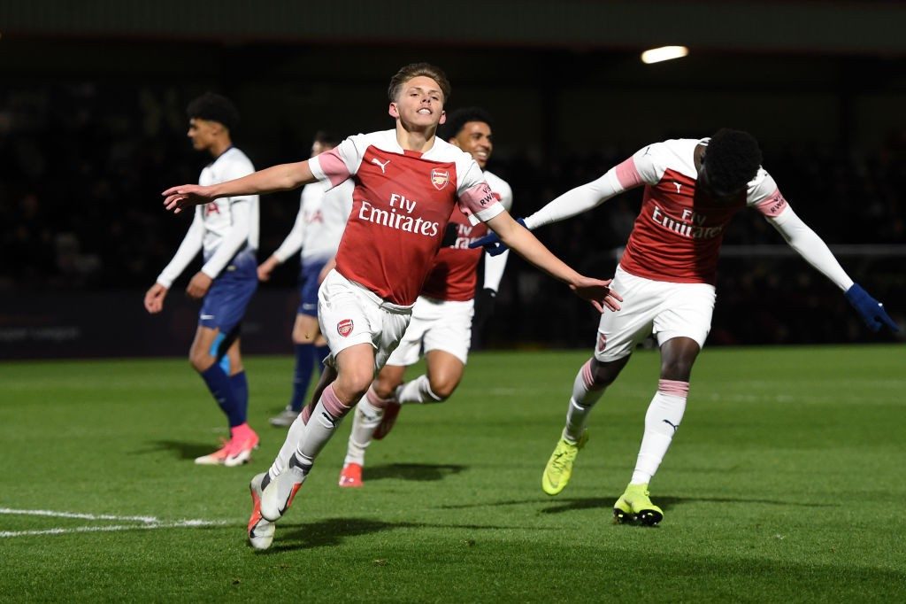 BOREHAMWOOD, ENGLAND - JANUARY 17: Ben Cottrell of Arsenal celebrates after scoring his team's first goal during the Fourth Round FA Youth Cup match between Arsenal and Tottenham Hotspur at Meadow Park on January 17, 2019 in Borehamwood, England. (Photo by Harriet Lander/Getty Images)