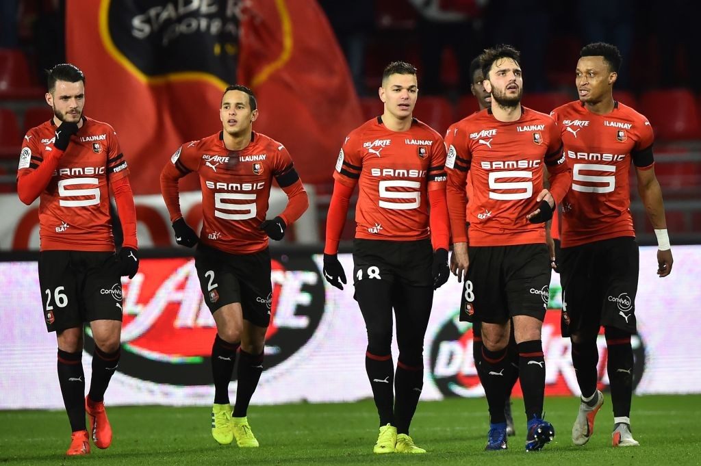 Rennes' French forward Hatem Ben Arfa (C) reacts with his teammates after scoring a goal during during the French L1 football match between Rennes (SRFC) and Saint-Etienne (ASSE), on February 10, 2019, at the Roazhon Park in Rennes, northwestern France. (Photo by JEAN-FRANCOIS MONIER / AFP / Getty Images)