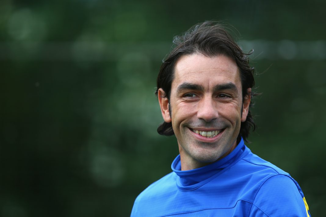 ST ALBANS, ENGLAND - SEPTEMBER 30: Robert Pires looks on during an Arsenal training session ahead of their Champions League Group F match against Napoli at London Colney on September 30, 2013 in St Albans, England. (Photo by Paul Gilham/Getty Images)