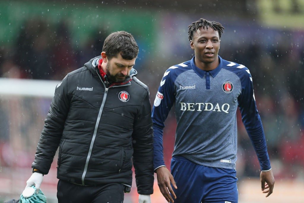 NORTHAMPTON, ENGLAND - MARCH 30: Joe Aribo of Charlton Athletic leaves the pitch with Alastair Thrush during the Sky Bet League One match between Northampton Town and Charlton Athletic at Sixfields on March 30, 2018 in Northampton, England. (Photo by Pete Norton/Getty Images)