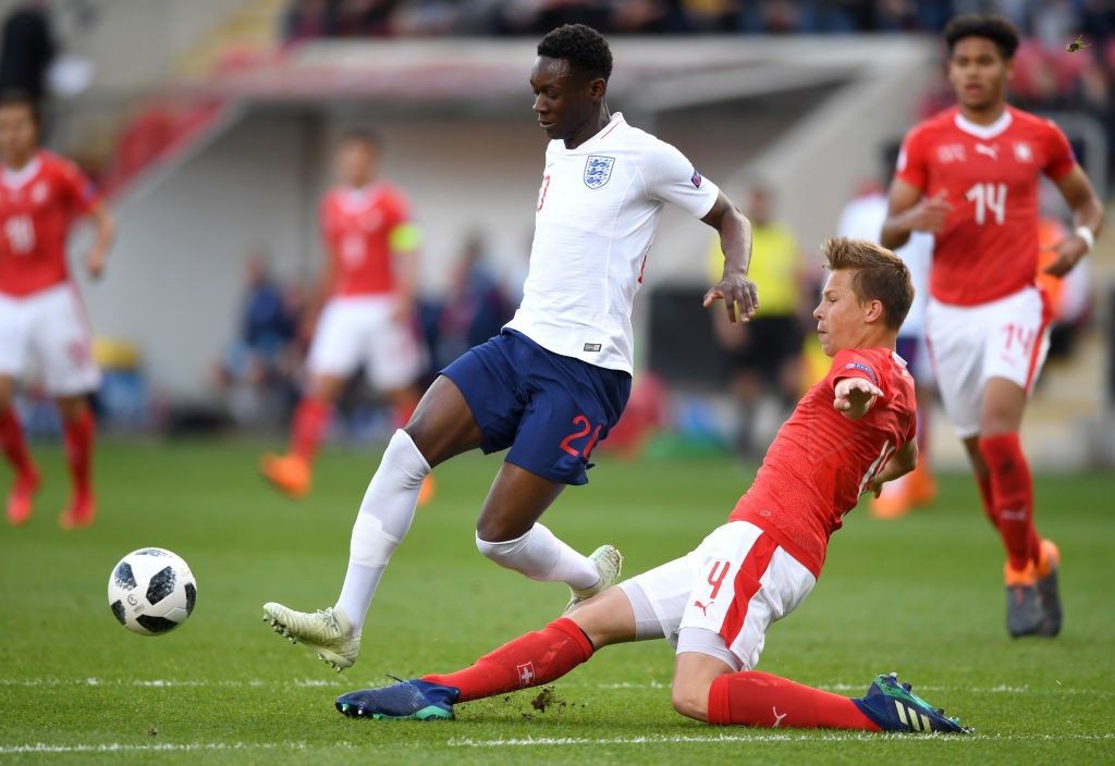 ROTHERHAM, ENGLAND - MAY 10: Folarin Balogun of England is tackled by Ilan Sauter of Switzerland during the UEFA European Under-17 Championship match between Switzerland and England at The New York Stadium on May 10, 2018 in Rotherham, England. (Photo by Gareth Copley/Getty Images)