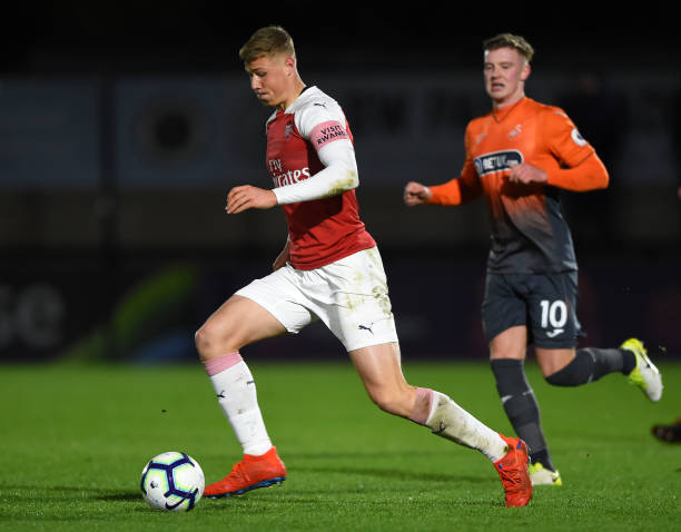 BOREHAMWOOD, ENGLAND - MARCH 04: Daniel Ballard of Arsenal runs with the ball during the Premier League 2 match between Arsenal and Swansea City at Meadow Park on March 04, 2019 in Borehamwood, England. (Photo by Harriet Lander/Getty Images)