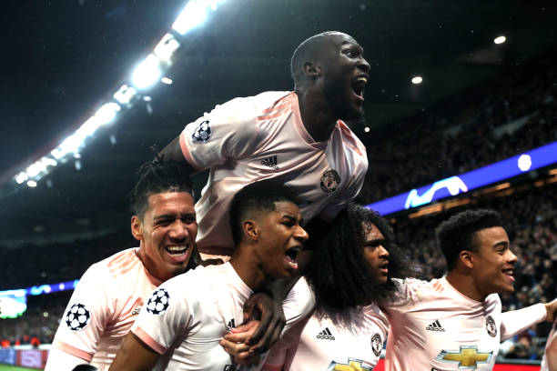 PARIS, FRANCE - MARCH 06: Marcus Rashford of Manchester United celebrates after scoring his sides third goal with teammates during the UEFA Champions League Round of 16 Second Leg match between Paris Saint-Germain and Manchester United at Parc des Princes on March 06, 2019 in Paris, . (Photo by Julian Finney/Getty Images)