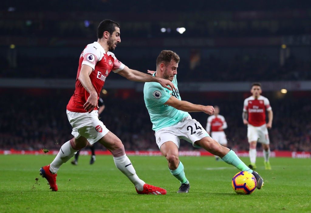 LONDON, ENGLAND - FEBRUARY 27: Ryan Fraser of AFC Bournemouth is challenged by Henrikh Mkhitaryan of Arsenal during the Premier League match between Arsenal FC and AFC Bournemouth at Emirates Stadium on February 27, 2019 in London, United Kingdom. (Photo by Catherine Ivill/Getty Images)
