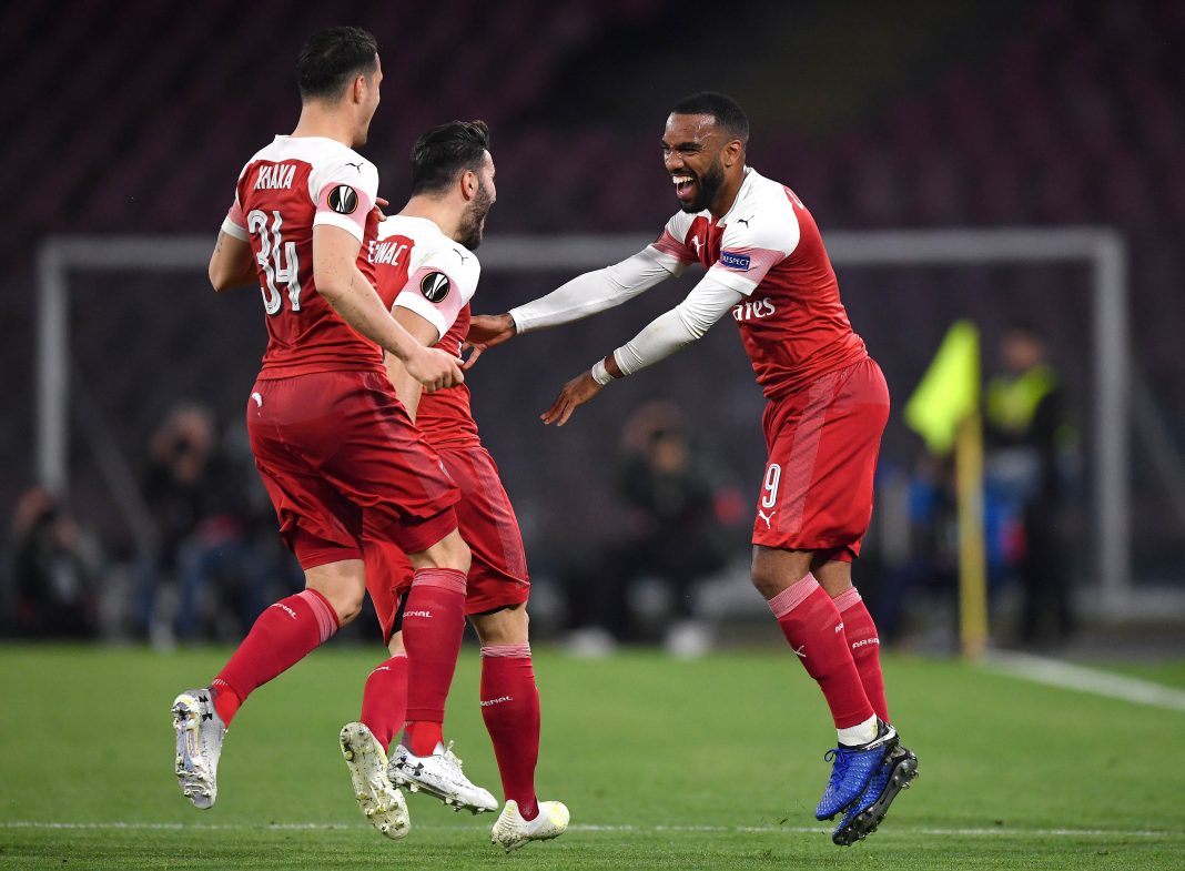NAPLES, ITALY - APRIL 18: Alexandre Lacazette of Arsenal celebrates scoring his sides first goal with Granit Xhaka and Sead Kolasinac during the UEFA Europa League Quarter Final Second Leg match between S.S.C. Napoli and Arsenal at Stadio San Paolo on April 18, 2019 in Naples, Italy. (Photo by Stuart Franklin/Getty Images)