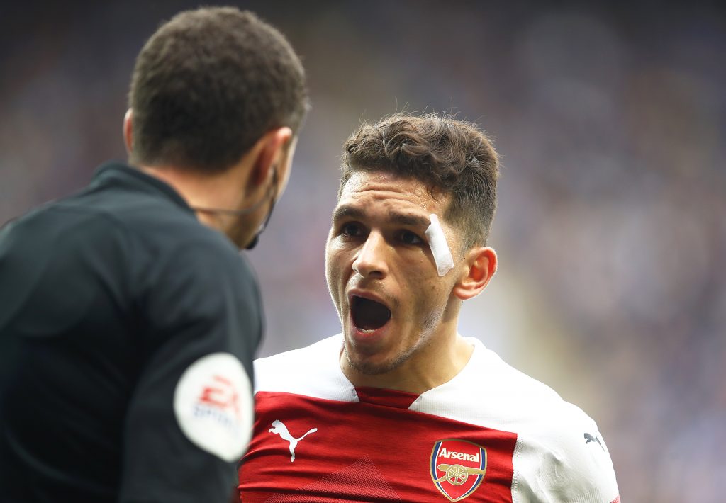 LEICESTER, ENGLAND - APRIL 28: Lucas Torreira of Arsenal reacts with the linesman during the Premier League match between Leicester City and Arsenal FC at The King Power Stadium on April 28, 2019 in Leicester, United Kingdom. (Photo by Julian Finney/Getty Images)