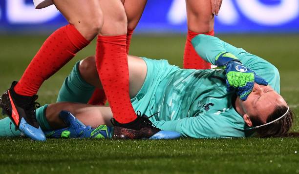 France's goalkeeper Pauline Peyraud-Magnin reacts on the pitch after being injured during the FIFA international friendly football match between France and Japan at the Abbe-Deschamps Stadium in Auxerre, on April 4, 2019. (Photo by FRANCK FIFE / AFP) 