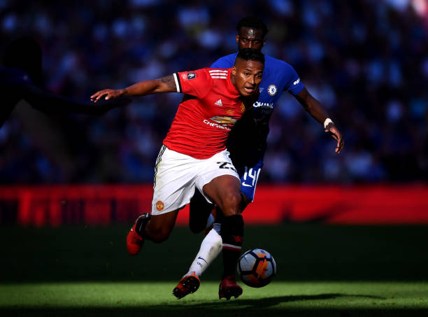 LONDON, ENGLAND - MAY 19:  Antonio Valencia of Manchester United is challenged by Tiemoue Bakayoko of Chelsea during The Emirates FA Cup Final between Chelsea and Manchester United at Wembley Stadium on May 19, 2018 in London, England.  (Photo by Laurence Griffiths/Getty Images)