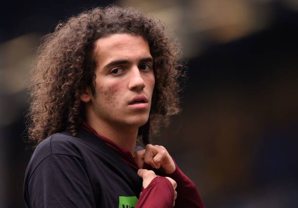 Arsenal's French midfielder Matteo Guendouzi warms up ahead of the English Premier League football match between Everton and Arsenal at Goodison Park in Liverpool, north west England on April 7, 2019. (Photo by Oli SCARFF / AFP)