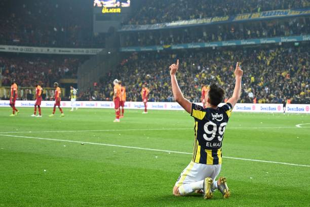 Fenerbahce's Macedonian midfielder Eljif Elmas celebrates after scoring a goal during the Turkish Super league football match between Fenerbahce and Galatasaray on April 14, 2019 at the Fenerbahce stadium in Istanbul. (Photo by OZAN KOSE / AFP) 