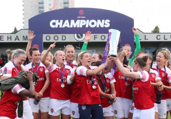 BOREHAMWOOD, ENGLAND - MAY 11: Jordan Nobbs and Kim Little of Arsenal lift the trophy as they celebrate after during the WSL match between Arsenal Women and Manchester City at Meadow Park on May 11, 2019 in Borehamwood, England. (Photo by Catherine Ivill/Getty Images)