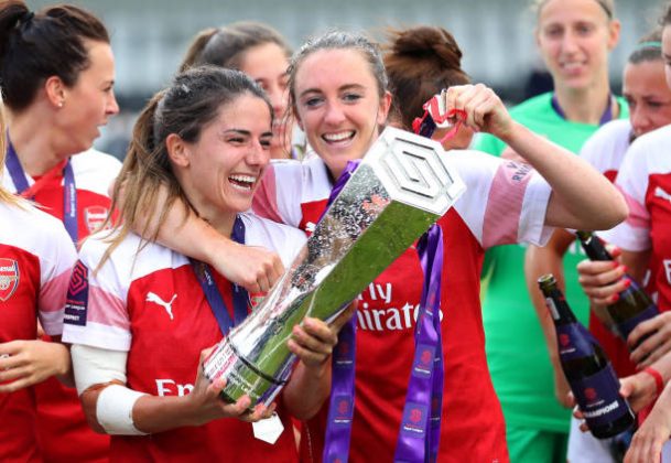 BOREHAMWOOD, ENGLAND - MAY 11: Danielle Van de Donk and Lisa Evans of Arsenal celebrate with the trophy after the WSL match between Arsenal Women and Manchester City at Meadow Park on May 11, 2019 in Borehamwood, England. (Photo by Catherine Ivill/Getty Images)