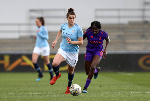 MANCHESTER, ENGLAND - MARCH 17: Jennifer Beattie of Manchester City controls the ball from Rinsola Babajide of Liverpool during the SSE Women's FA Cup Quarter Final match between Manchester City Women and Liverpool Women at The Academy Stadium on March 17, 2019 in Manchester, England. (Photo by Jan Kruger/Getty Images)