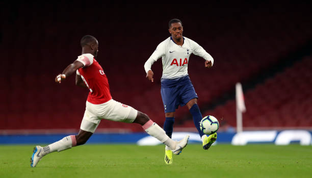 LONDON, ENGLAND - AUGUST 31: Jaden Brown of Tottenham Hotspur beats Joseph Olowu during the Premier League 2 match between Arsenal and Tottenham Hotspur at Emirates Stadium on August 31, 2018 in London, England. (Photo by Catherine Ivill/Getty Images)