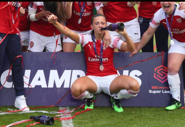 BOREHAMWOOD, ENGLAND - MAY 11: Katie McCabe of Arsenal enjoys a drink of champagne as she celebrates winning the Women's Super League after the WSL match between Arsenal Women and Manchester City at Meadow Park on May 11, 2019 in Borehamwood, England. (Photo by Catherine Ivill/Getty Images)