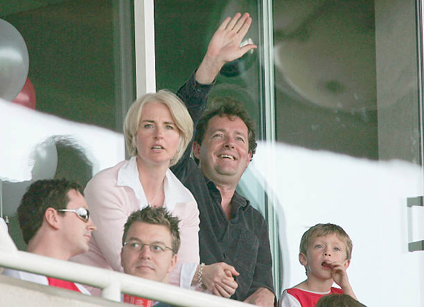 LONDON - MAY 15: Former Daily Mirror Editor, Piers Morgan with his family during the FA Barclaycard Premiership match between Arsenal and Leicester City at Highbury on May 15, 2004 in London. Morgan, was forced to resign from the paper on May 14, after it was proven that a set of photos he had published, purporting to show British troops abusing Iraqi prisoners were in fact fake. (Photo by Clive Mason/Getty Images)