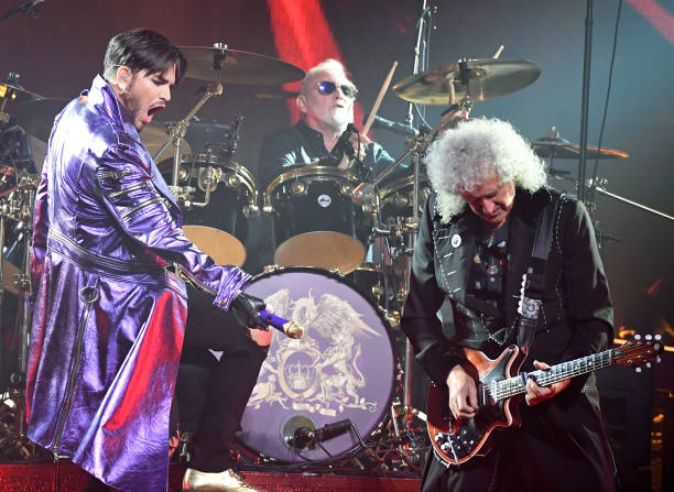 LAS VEGAS, NV - SEPTEMBER 01:  (L-R) Singer Adam Lambert, drummer Roger Taylor and guitarist Brian May of Queen + Adam Lambert perform as the group kicks off its 10-date limited engagement, "The Crown Jewels," at Park Theater at Park MGM on September 1, 2018 in Las Vegas, Nevada.  (Photo by Ethan Miller/Getty Images)