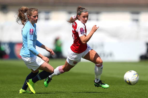 BOREHAMWOOD, ENGLAND - MAY 11:  Katie McCabe of Arsenal battles for possession with Janine Beckie of Manchester City Women during the WSL match between Arsenal Women and Manchester City Women at Meadow Park on May 11, 2019 in Borehamwood, England. (Photo by Catherine Ivill/Getty Images)
