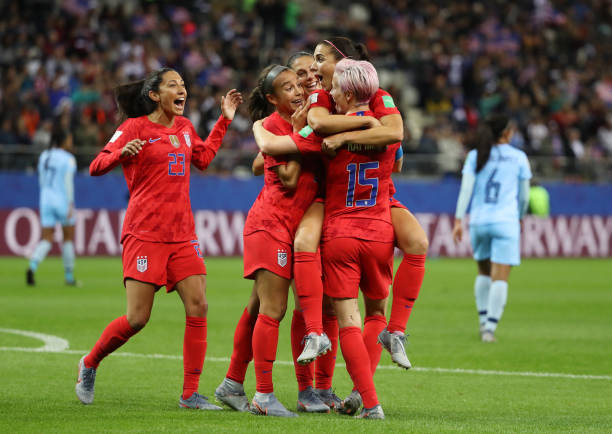REIMS, FRANCE - JUNE 11: Alex Morgan of the USA celebrates with teammates after scoring her team's twelfth goal during the 2019 FIFA Women's World Cup France group F match between USA and Thailand at Stade Auguste Delaune on June 11, 2019 in Reims, France. (Photo by Robert Cianflone/Getty Images)