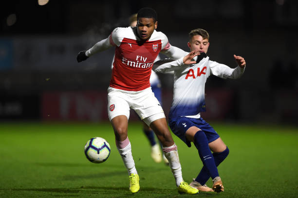 BOREHAMWOOD, ENGLAND - JANUARY 17: Vontae Daley-Campbell of Arsenal is challenged by Chay Cooper of Tottenham Hotspur during the Fourth Round FA Youth Cup match between Arsenal and Tottenham Hotspur at Meadow Park on January 17, 2019 in Borehamwood, England. (Photo by Harriet Lander/Getty Images)