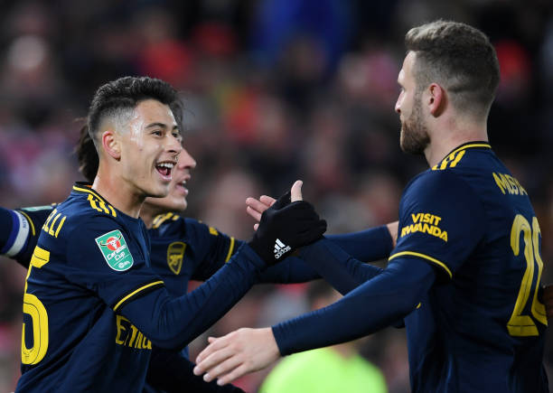 LIVERPOOL, ENGLAND - OCTOBER 30: Gabriel Martinelli of Arsenal celebrates after scoring his team's second goal with Shkodran Mustafi of Arsenal during the Carabao Cup Round of 16 match between Liverpool and Arsenal at Anfield on October 30, 2019 in Liverpool, England. (Photo by Laurence Griffiths/Getty Images)