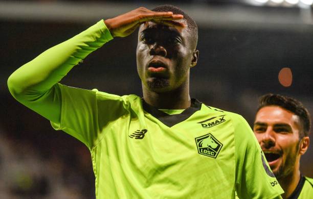 Lille's Ivorian forward Nicolas Pepe celebrates after scoring a goal during the French L1 football match between Montpellier and Lille on December 4, 2018 at the the Mosson stadium in Montpellier, southern France. (Photo by PASCAL GUYOT / AFP)