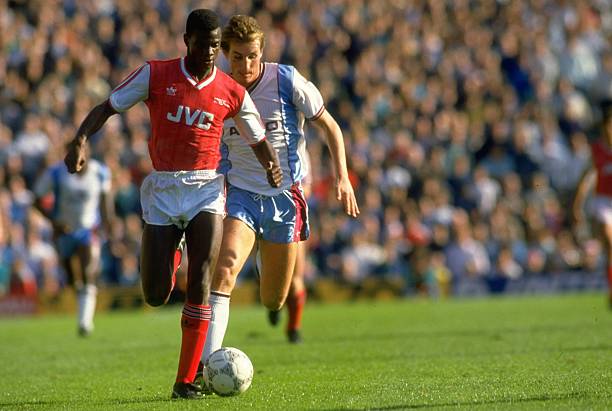 Undated: Paul Davis of Arsenal shields the ball from Alvin Martin of West Ham United during a match at Highbury Stadium in London. Arsenal won the match 1-0. Credit: Dan Smith/Allsport