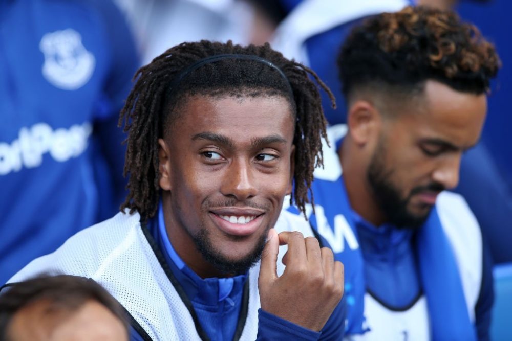 LIVERPOOL, ENGLAND - AUGUST 17: Alex Iwobi of Everton looks on from the bench during the Premier League match between Everton FC and Watford FC at Goodison Park on August 17, 2019, in Liverpool, United Kingdom. (Photo by Jan Kruger/Getty Images)