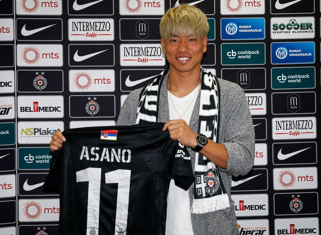 BELGRADE, SERBIA - AUGUST 03: Takuma Asano poses for photo after signing for Partizan Belgrade on August 3, 2019 in Belgrade, Serbia. (Photo by Srdjan Stevanovic/Getty Images)