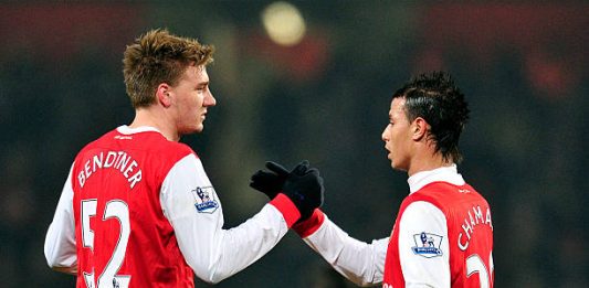 Arsenal's Danish striker Nicklas Bendtner (L) celebrates scoring the second goal with Moroccan striker Marouane Chamakh (R) during their FA Cup fifth round replay football match against Leyton Orient at the Emirates Stadium, London, England, on March 2, 2011. AFP PHOTO/ GLYN KIRK