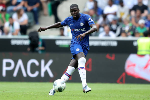 MOENCHENGLADBACH, GERMANY - AUGUST 03: Kurt Zouma of Chelsea runs with the ball during the pre-season friendly match between Borussia Moenchengladbach and FC Chelsea at Borussia-Park on August 03, 2019 in Moenchengladbach, Germany. The match between Moenchengladbach and Chelsea ended 2-2.  (Photo by Christof Koepsel/Bongarts/Getty Images)
