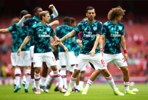 LONDON, ENGLAND - AUGUST 17: Dani Ceballos of Arsenal and his team mates warm up ahead of the Premier League match between Arsenal FC and Burnley FC at Emirates Stadium on August 17, 2019 in London, United Kingdom. (Photo by Julian Finney/Getty Images)