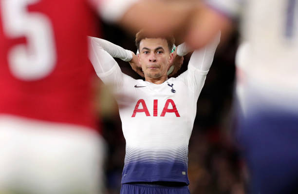 LONDON, ENGLAND - DECEMBER 19: Dele Alli of Tottenham Hotspur reacts during the Carabao Cup Quarter Final match between Arsenal and Tottenham Hotspur at Emirates Stadium on December 19, 2018 in London, United Kingdom. (Photo by Alex Morton/Getty Images)