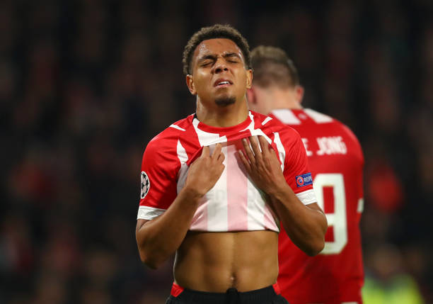 EINDHOVEN, NETHERLANDS - NOVEMBER 28: Donyell Malen of PSV Eindhoven reacts at the full time whistle after the UEFA Champions League Group B match between PSV Eindhoven and FC Barcelona at Philips Stadion on November 28, 2018 in Eindhoven, Netherlands. (Photo by Dean Mouhtaropoulos/Getty Images)