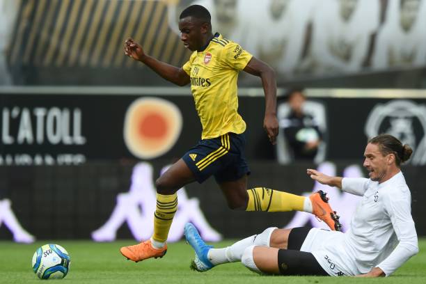 Arsenal's English striker Eddie Nketiah (L) vies for the ball with Angers' French defender Mateo Pavlovic (R) during the international friendly football match between Angers SCO and Arsenal FC, at the Raymond-Kopa Stadium, in Angers, northwestern France, on July 31, 2019. (Photo by JEAN-FRANCOIS MONIER / AFP)
