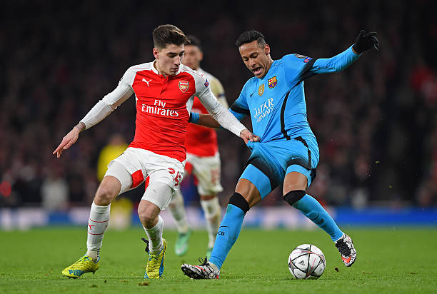 LONDON, ENGLAND - FEBRUARY 23: Neymar of Barcelona is challenged by Hector Bellerin of Arsenal during the UEFA Champions League round of 16, first leg match between Arsenal FC and FC Barcelona at the Emirates Stadium on February 23, 2016 in London, United Kingdom. (Photo by Shaun Botterill/Getty Images)